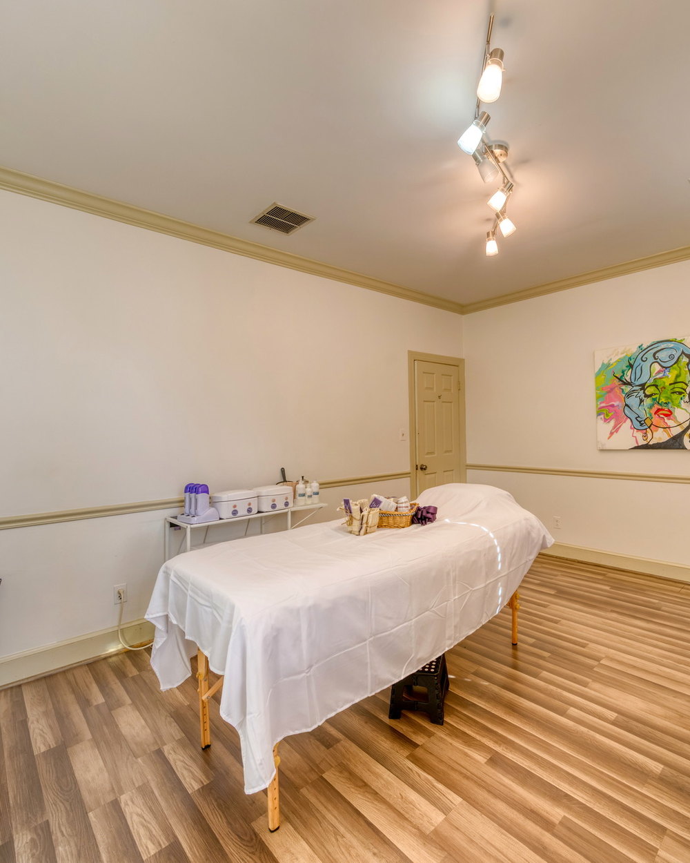 A private waxing treatment room at Bare Skin Waxing in Old Town Alexandria