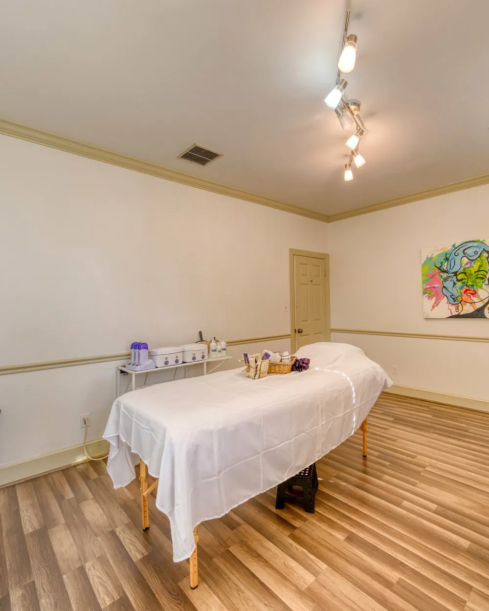 A private waxing treatment room at Bare Skin Waxing in Old Town Alexandria